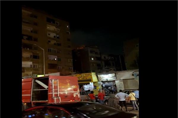 حريق أعلى سطح عقار بالدقي