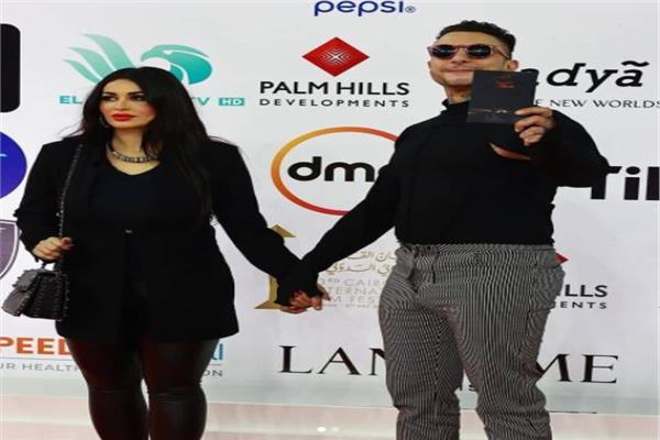 ظهور احمد الفيشاوي وزوجته لمهرجان القاهرة السينمائي الدولي