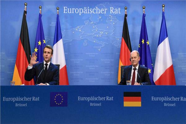 الرئيس الفرنسي والمستشار الألماني أولاف شولتس