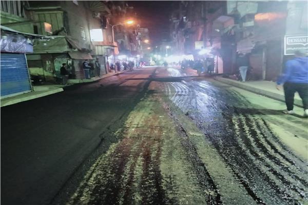 استمرار أعمال تطوير الطرق بشارع الاعتماد بشمال الجيزة