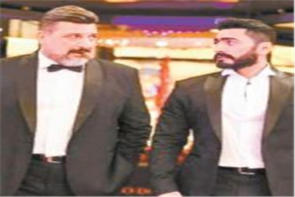 تامر حسنى وخالد الصاوى فى فيلم «الفلوس»