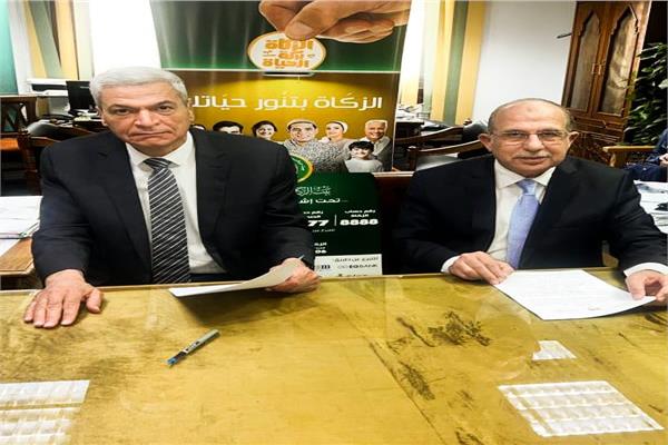 جانب من توقيع البروتكول 