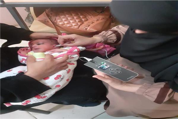 توقيع الكشف الطبي أحد الأطفال