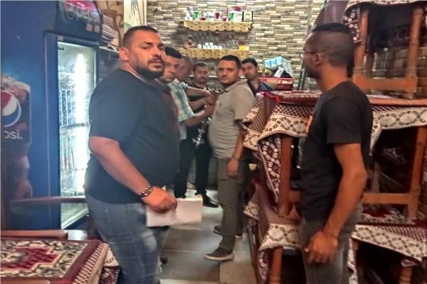 رفع 700 حاله اشغال وشيشة للمحال والمقاهي وكلبشة السيارات المتعدية بالطالبية