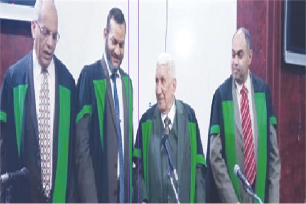 الباحث مع لجنة الاشراف والحكم بعد المناقشة
