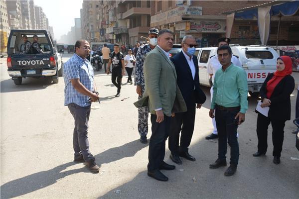  رصف وإصلاح الهبوط الأرضي بطريق الرياح التوفيقي ببنها 