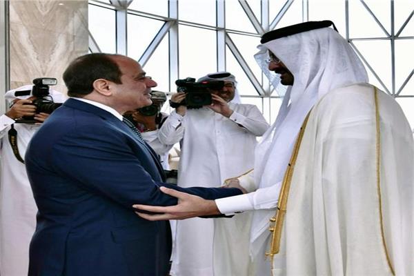 الرئيس السيسي لدى وصوله الدوحة
