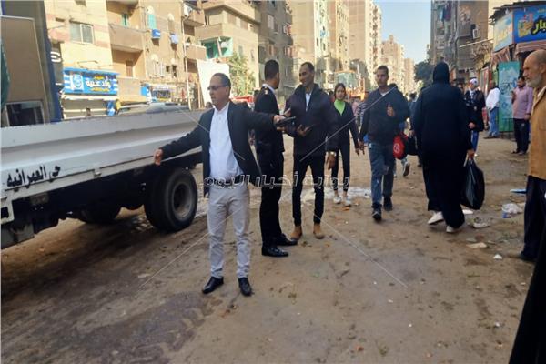 رفع مخلفات الباعة الجائلين بالعمرانية