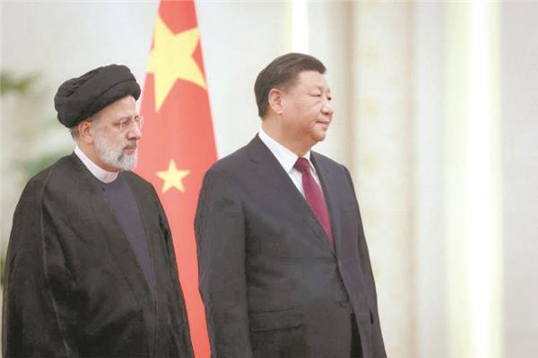 جين بينج خلال استقباله إبراهيم رئيسى