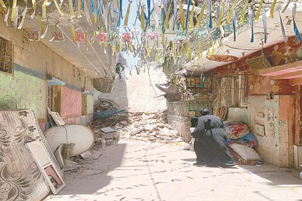 أنقاض العقار المنهار بحدائق القبة
