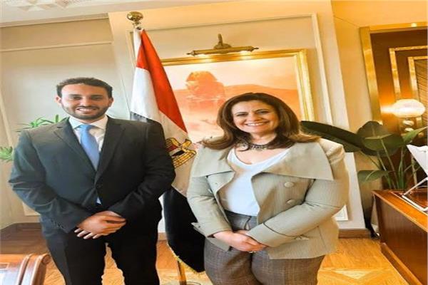 وزيرة الهجرة والباحث أحمد خطاب