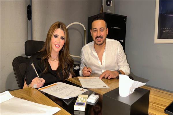 محمد دياب والمنتجة الأء لاشين
