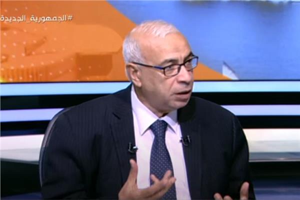 الكاتب الصحفي علي حسن