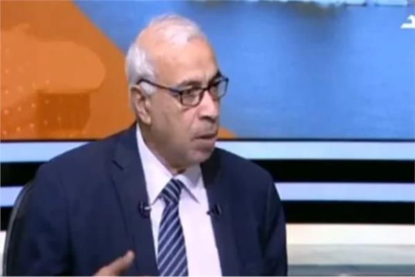 الكاتب الصحفي علي حسن