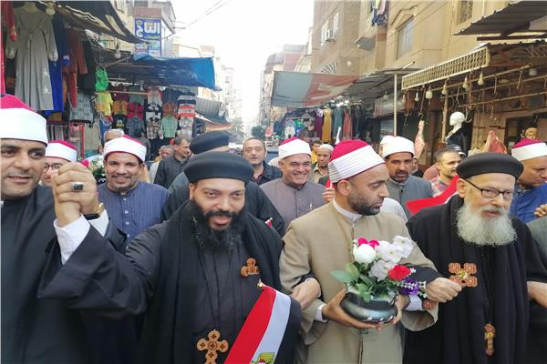 مسيرة حاشدة لرجال الدين الإسلامي والقبطي