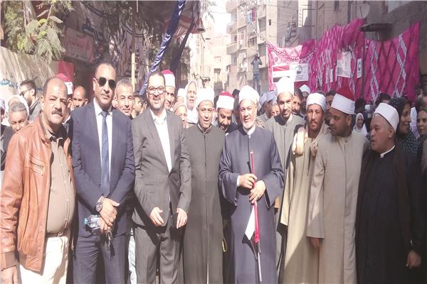 وفد من الأوقاف في لجنة مدرسة الثورة بحي غرب مدينة أسيوط