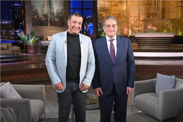 الإعلامي أسامة كمال والشاعر هشام الجخ