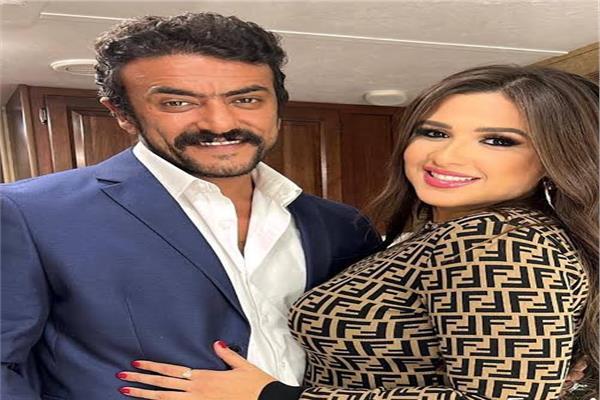 ياسمين عبد العزيز وأحمد العوضي