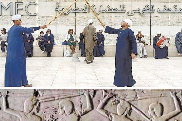 لاعبو التحطيب يستعرضون مهارتهم أمام متحف الحضارة