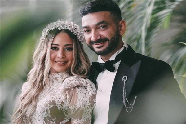 نادر حمدي رفقة زوجته سارة حسني