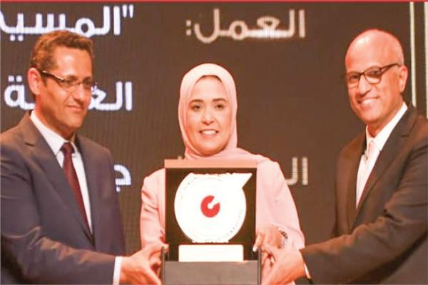 ساره أحمد محررة الأخبار خلال تكريمها فى نقابة الصحفيين