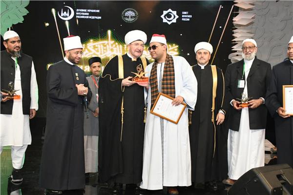 الدكتور أسامة الأزهري والمتسابق الشيخ محمد عبد الكريم كام