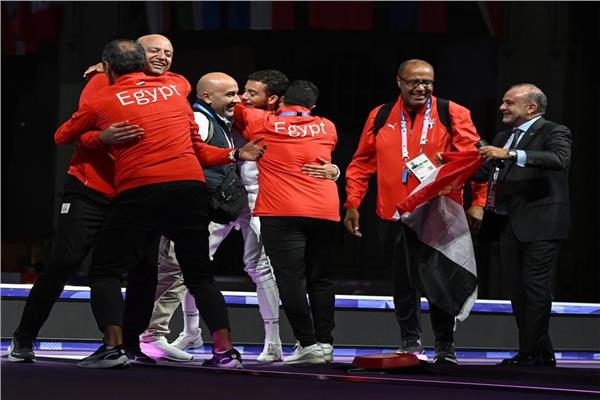 احتفال البعثة المصرية بتتويج محمد السيد بالميدالية البرونزية