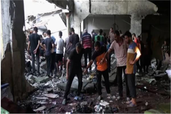 مشهد من صباح يوم مجزرة الفجر بمدرسة التابعين في غزة - صورة أرشيفية