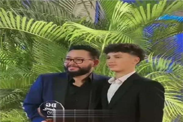 الفنان أحمد رزق ونجله