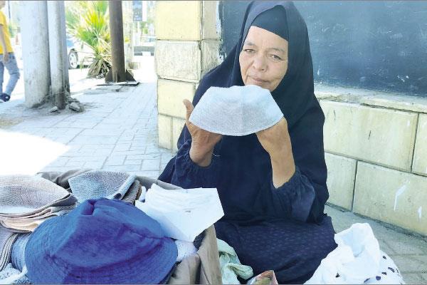  الحاجة منى خلال بيع «الطواقى الصوف»