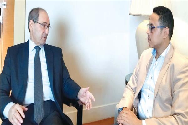وزير الخارجبة السورى فيصل المقداد مع محرر «الأخبار»