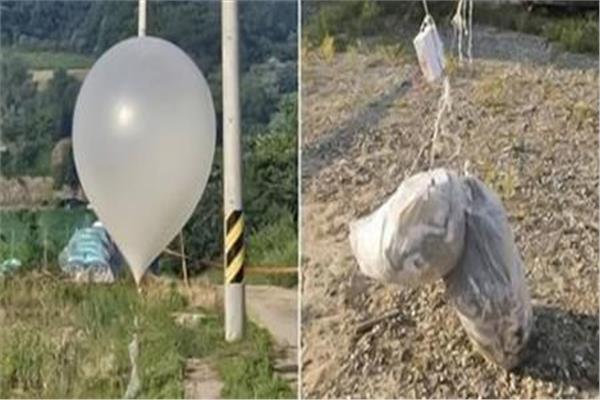  بالون محمل بالقمامة 
