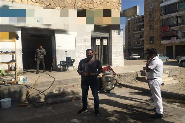 جانب من الحملات علي محال غسيل السيارات
