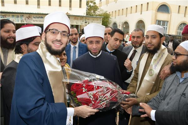 الدكتور أسامة الأزهري وزير الأوقاف و الباحث محمد ركزي عبد الرشيد