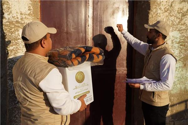  توزيع بطاطين وملابس جديدة