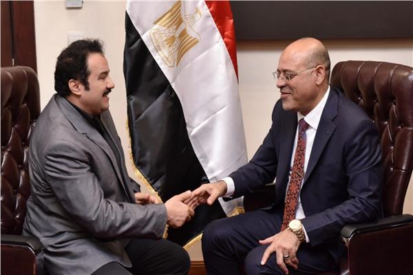 وزير العمل ومحرر بوابة أخبار اليوم