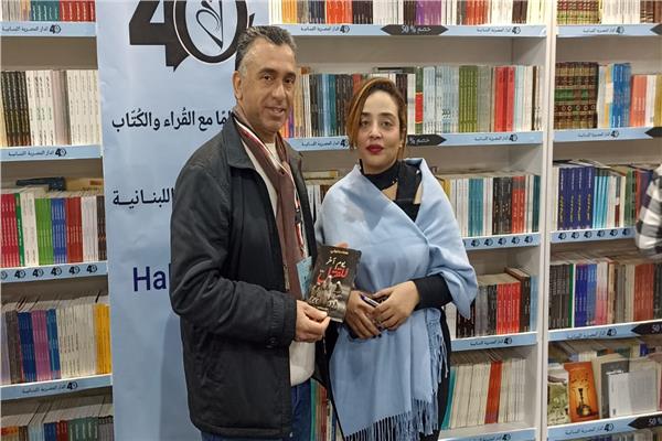 الأديبة هناء متولي مع سيد علي