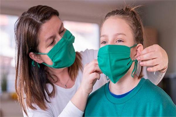 الأرصاد تحذر المواطنين يجب ارتداء الكمامة - صورة تعبيرية