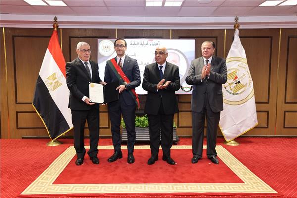 وزير العدل والنائب العام أثناء التكريم