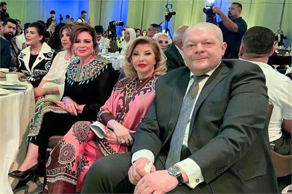 هالة سرحان وإلهام شاهين خلال مشاركتهما بمؤتمر في العراق