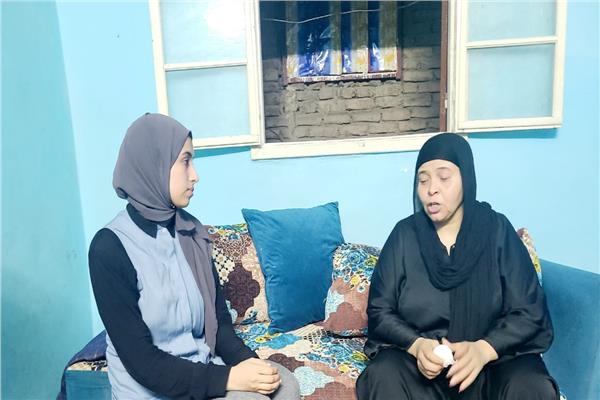 محررة بوابة اخبار اليوم ووالدة المجني عليه