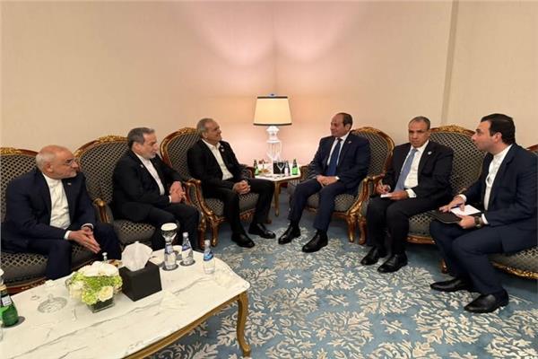 الرئيس السيسي ونظيره الإيراني