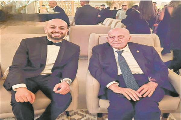 أحمد مراد مع السير مجدى يعقوب خلال حفل افتتاح المتحف الكبير