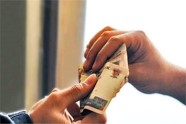 مساعدات نقديه من بيت الزكاة والصدقات - صورة تعبيرية