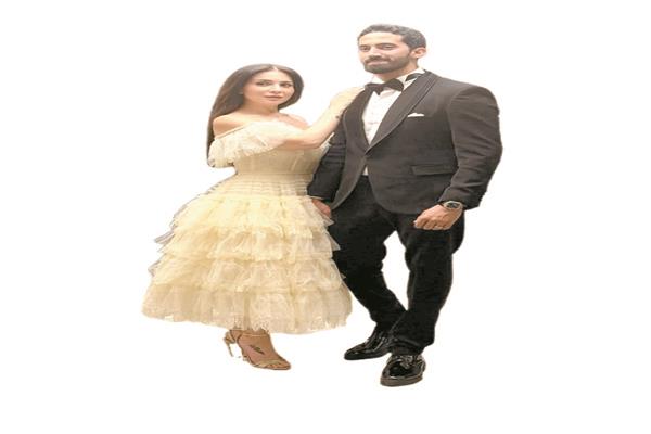مى عز الدين وزوجها