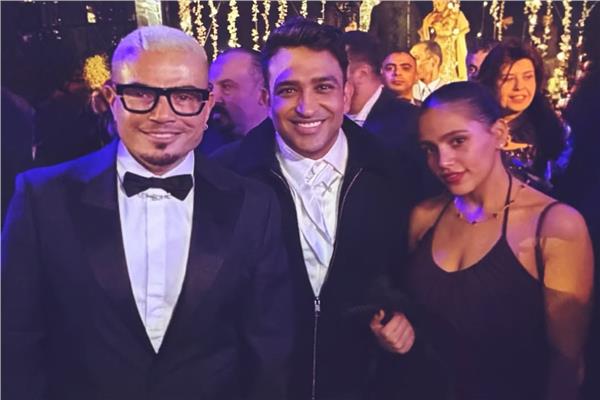 عمرو دياب مع ابنته جنا وتامر حسين