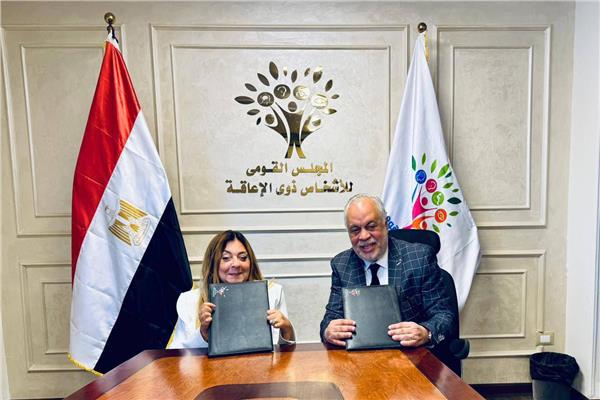 جانب من بروتوكول تعاون المهن التمثيلية والمجلس القومي للإعاقة