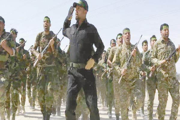 استعراض سابق لأحد فصائل الحشد الشعبى العراقى
