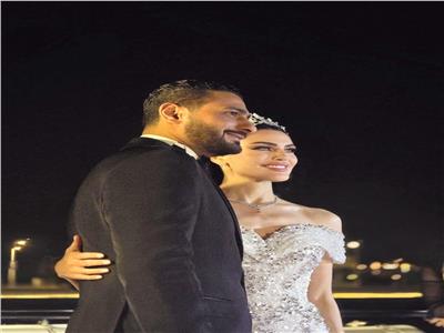 إطلالة ساحرة لدارين حداد بفستان أبيض في حفل زفافها 