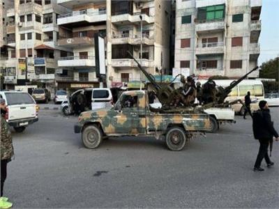 اشتباكات عنيفة في ريف اللاذقية تسفر عن تدمير عدة منازل